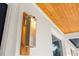 Close up of exterior lamp and cedar planking on front facade at 3709 Danny Bryan Blvd, Tampa, FL 33619