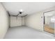 View of the attached two-car garage with finished floor and modern door opening system at 3709 Danny Bryan Blvd, Tampa, FL 33619