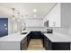 Spacious kitchen featuring an island with white countertops, modern appliances and gold fixtures at 3709 Danny Bryan Blvd, Tampa, FL 33619