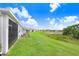 Enjoy a well-manicured lawn, pond views, and relaxing backyard setting from this home at 3719 Stormy Thistle Pl, Plant City, FL 33565