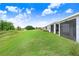 Enjoy the outdoors with this lush lawn and screened-in patio views of the community at 3719 Stormy Thistle Pl, Plant City, FL 33565