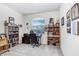 Office space with bookshelves, natural light, and a comfortable workspace at 3719 Stormy Thistle Pl, Plant City, FL 33565