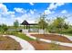 Community pavilion with seating and scenic views of the surrounding landscape at 3719 Stormy Thistle Pl, Plant City, FL 33565