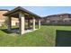 Outdoor gazebo with concrete floor and picnic table at 4017 Cedar Limb Ct, Tampa, FL 33614