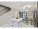 Kitchen island blending seamlessly into the living space; great for entertaining at 4017 Cedar Limb Ct, Tampa, FL 33614