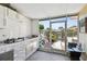Enclosed lanai with outdoor kitchen, providing a perfect space for entertaining and relaxing at 4017 Cedar Limb Ct, Tampa, FL 33614
