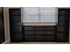 Bedroom with shelving unit provides ample storage space in the room at 4021 19Th N St, St Petersburg, FL 33714