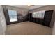 Spacious bedroom featuring a nature mural and plenty of storage with black shelving at 4021 19Th N St, St Petersburg, FL 33714