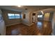 Inviting dining room with hardwood floors and a seamless transition to the living room at 4021 19Th N St, St Petersburg, FL 33714