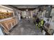 A functional garage with a workbench, shelving, and ample space for parking and storage at 4021 19Th N St, St Petersburg, FL 33714