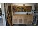 A garage workbench with drawers and cabinets with pegboard on the wall, ideal for projects and storage at 4021 19Th N St, St Petersburg, FL 33714