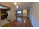 The living room offers hardwood flooring and a view into the kitchen and front entrance at 4021 19Th N St, St Petersburg, FL 33714