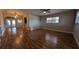 Open-concept living room features hardwood flooring and plenty of natural light at 4021 19Th N St, St Petersburg, FL 33714