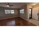 Bright living room with hardwood floors and a view of the front yard at 4021 19Th N St, St Petersburg, FL 33714