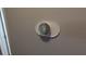 A modern smart thermostat is mounted on the wall of the home's interior at 4021 19Th N St, St Petersburg, FL 33714