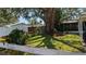 The side yard has a mix of shady and sunny areas, with some landscaping at 4021 19Th N St, St Petersburg, FL 33714