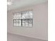Bedroom with a large window and fan at 4234 Brentwood Park Cir, Tampa, FL 33624