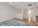 Bright room with wood floors, fan and neutral colored walls at 4234 Brentwood Park Cir, Tampa, FL 33624