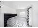 This bedroom features a sleek platform bed, modern headboard and built-in storage at 4521 W North St, Tampa, FL 33614