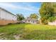 Spacious backyard featuring a lush lawn and a privacy fence at 4611 17Th N Ave, St Petersburg, FL 33713