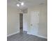 Bright bedroom with tiled floors, ceiling fan, and closet at 4611 17Th N Ave, St Petersburg, FL 33713
