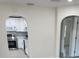 Modern kitchen with stainless steel appliances and white cabinets at 4611 17Th N Ave, St Petersburg, FL 33713