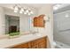 Bathroom featuring vanity, mirror, lighting and shower at 512 Hillpine Way, Brandon, FL 33510