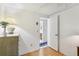 Bedroom featuring wood floors and door to bathroom at 512 Hillpine Way, Brandon, FL 33510