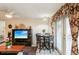 Casual dining area with tile flooring, a ceiling light, and sliding glass door access at 512 Hillpine Way, Brandon, FL 33510