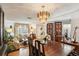 Open concept home showcasing a formal dining area with seating for six at 512 Hillpine Way, Brandon, FL 33510