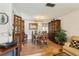 Elegant dining room with hardwood floors, a wooden table, and a decorative chandelier at 512 Hillpine Way, Brandon, FL 33510