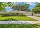 Charming single story home with a manicured lawn, trimmed hedges, and a two car garage at 512 Hillpine Way, Brandon, FL 33510