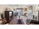 Cozy living room featuring a sofa, TV, ceiling fan, and access to an outdoor patio at 512 Hillpine Way, Brandon, FL 33510