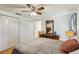Light and airy main bedroom featuring ceiling fan, closet, and wood floors at 512 Hillpine Way, Brandon, FL 33510