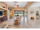 The cozy living room features sliding glass doors leading to an enclosed patio area and backyard at 5156 Pinnacle Dr, Oldsmar, FL 34677