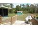 Relax on the back porch overlooking the large yard at 5287 Azalea Cir, Dade City, FL 33523