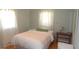 Cozy bedroom featuring natural light and simple decor at 5287 Azalea Cir, Dade City, FL 33523