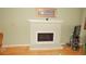 Cozy living space with a painted brick fireplace at 5287 Azalea Cir, Dade City, FL 33523