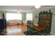 Bright living room with lots of natural light and hardwood floors at 5287 Azalea Cir, Dade City, FL 33523