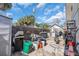 Backyard area with wooden fence, storage, and some patio space at 5713 Shore S Blvd, Gulfport, FL 33707