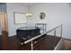 Stylish dining area with hardwood floors, glass table, upholstered chairs, and modern light fixture at 612 Arbor Lake Ln, Tampa, FL 33602
