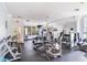 Well-equipped fitness center with modern exercise machines, free weights, and mirrored walls at 612 Arbor Lake Ln, Tampa, FL 33602