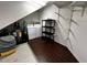 Convenient laundry area with side-by-side washer and dryer, shelving, and tiled flooring at 612 Arbor Lake Ln, Tampa, FL 33602