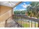 Enjoy serene waterfront views from this home's private balcony at 6309 Newtown Cir # 9B2, Tampa, FL 33615