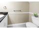 Powder room with modern fixtures, granite countertop and neutral walls at 6309 Newtown Cir # 9B2, Tampa, FL 33615