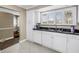 Kitchen featuring modern appliances, sink and cabinets at 6309 Newtown Cir # 9B2, Tampa, FL 33615