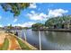 Beautiful canal view with boats docked along the waterfront, perfect for relaxing and enjoying waterfront living at 6309 Newtown Cir # 9B2, Tampa, FL 33615