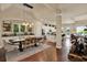 Bright dining area with a large table, pendant lighting, and easy access to the kitchen at 6909 Crestpoint Dr, Apollo Beach, FL 33572