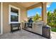This outdoor kitchen features stainless steel appliances, plenty of counter space, and a built-in grill at 6909 Crestpoint Dr, Apollo Beach, FL 33572