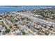 Stunning aerial view of a residential area near the water with neatly arranged homes at 7607 22Nd W Ave, Bradenton, FL 34209